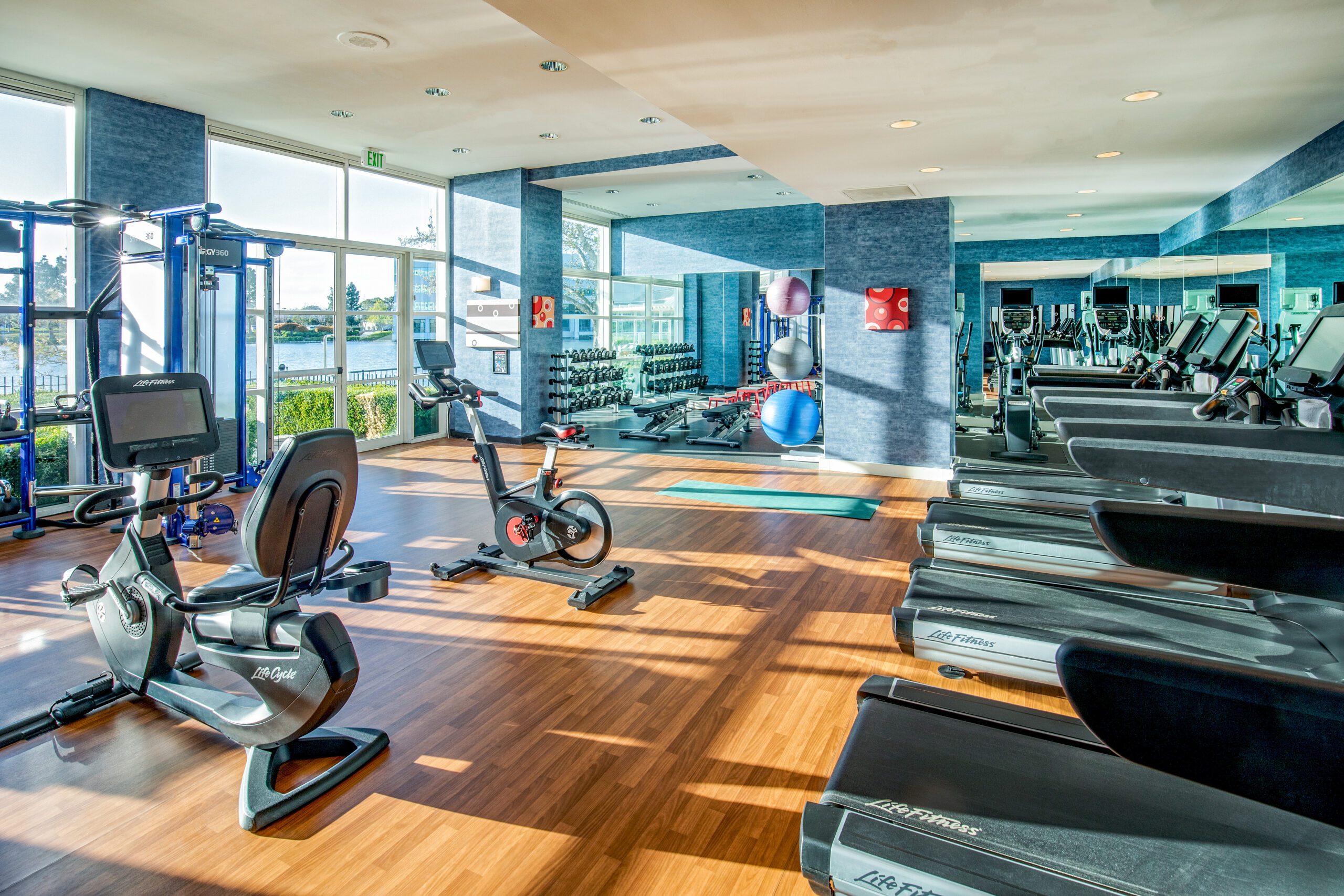 Redwood City hotel with spacious fitness center with free weights and exercise machines at Grand Bay Hotel San Francisco