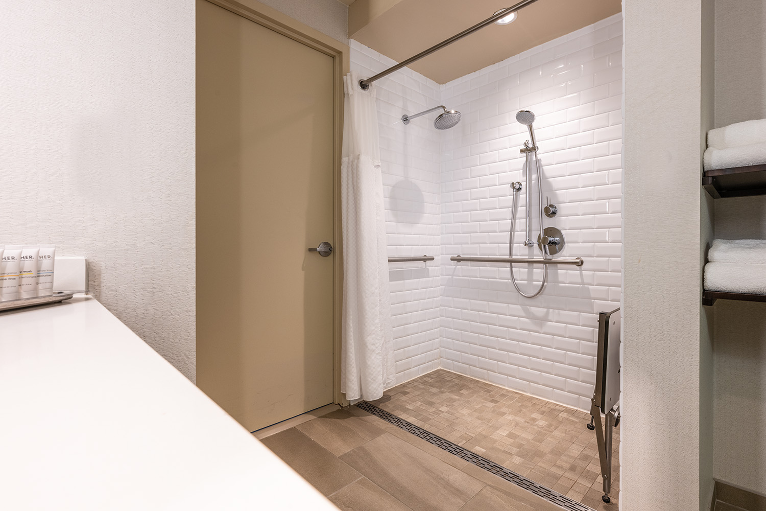 accessible shower and bathroom in grand bay hotel rooms in redwood city