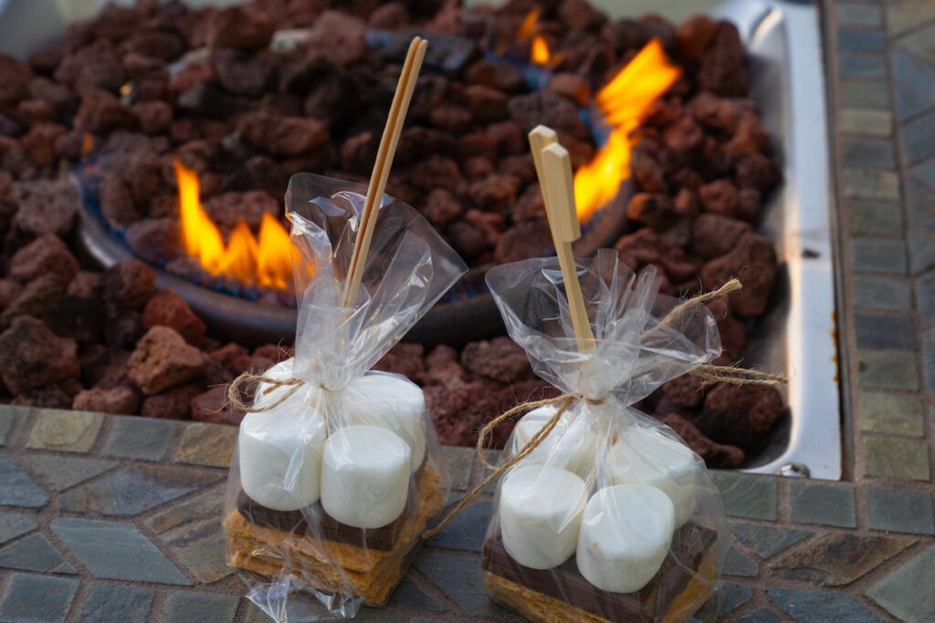 smores next to a firepit outside grand bay hotel san francisco