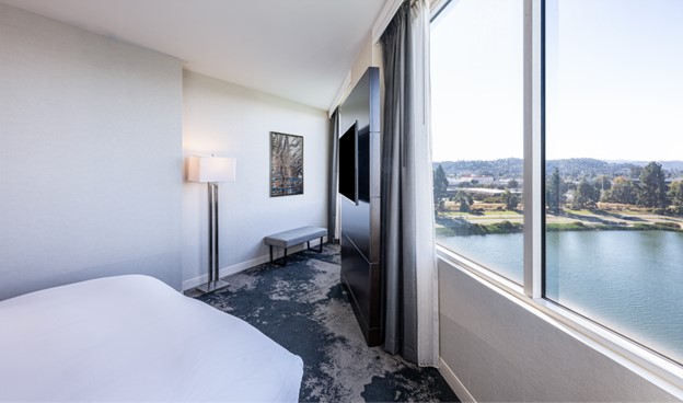 Grand Bay Hotel San Francisco Corner King guest suite with waterfront views of Redwood Shores Lagoon