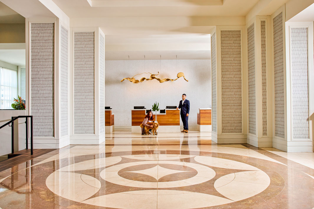 pet owner and dog at Grand Bay Hotel